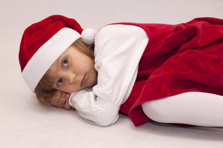 Holiday Card - girl as Santa Clauseの写真素材