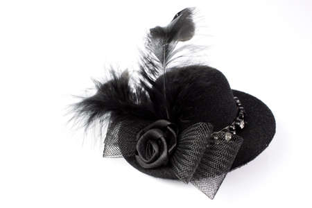 Black hat with feathers and bowの写真素材