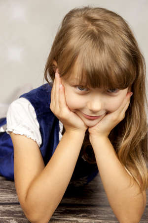Girl supported on the handsの写真素材