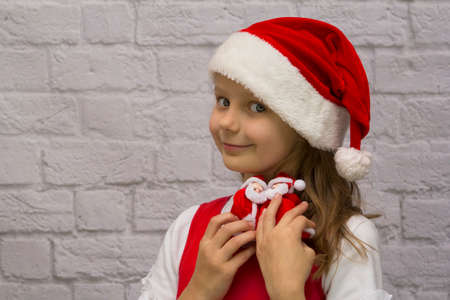 Beauty girl dressed as Santa Clausの写真素材