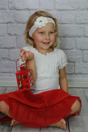 Christmas girl with flower in her hairの写真素材