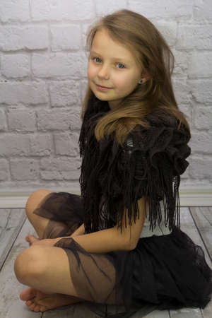 Pretty girl in a scarf chimneyの写真素材