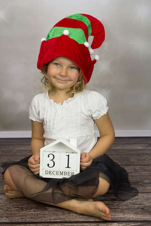Girl in colorful hat elfの写真素材