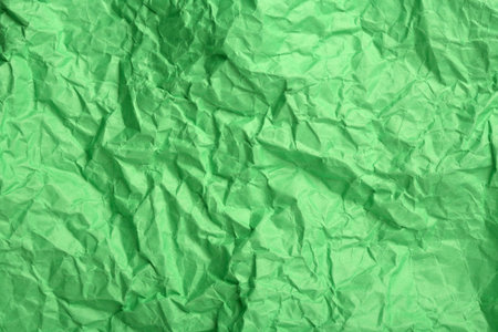 Green wrinkled paper useful for backgroundsの写真素材