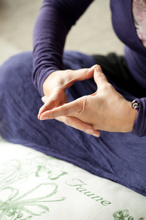Woman holding uttarabodhi mudra hand positionの写真素材