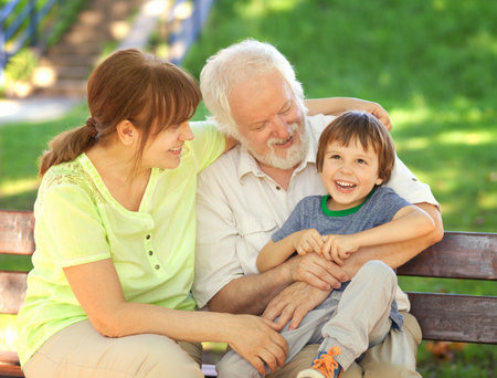 Grandparents having great fun with their grandchild