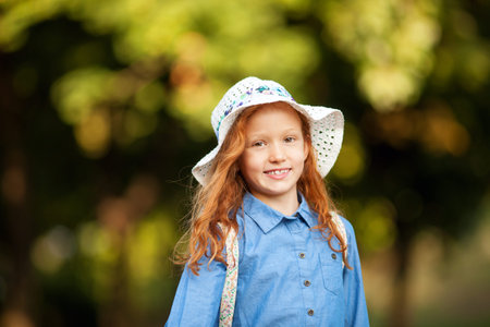 Close up portrait adorable little red-haired girl