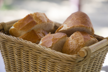 Slices of Spanish bread on basketの写真素材