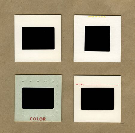 vintage background with four types of slide photography mountsの写真素材