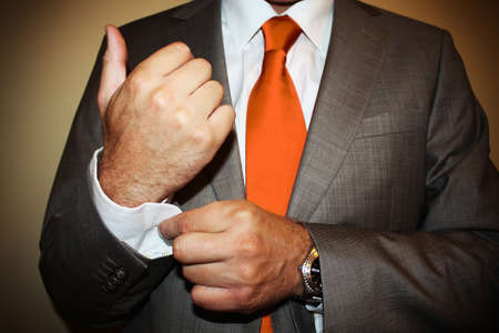 Business man with orange tieの写真素材