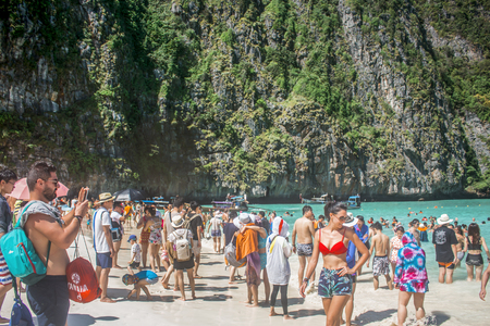 Krabi, Thailand - January 2018: Overcrowded Maya Bay beach, closed indefinitely after environmental damage from touristsのeditorial素材