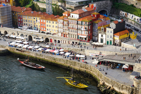Porto, Portugal - December 2018: View from Luis I Bridge to the Ribeira area and the Douro River...