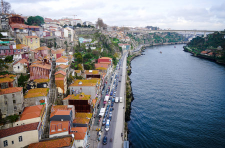Porto, Portugal - December 2018: View from Luis I Bridge to Avenida Gustavo Eiffel with traffic jam...