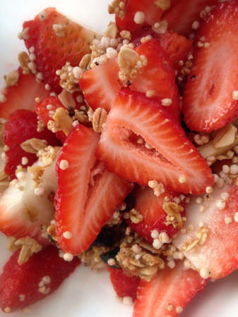 Healthy plate of strawberries with granola and quinoaの素材