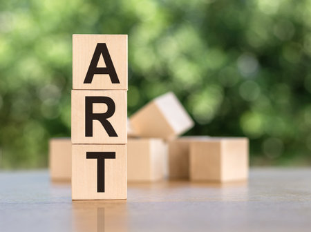 ART word written on wood block. Art text on wooden table for your desing, concept.の写真素材