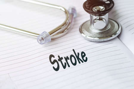 Text Stroke, background and a stethoscope near the text. Medical conceptの写真素材