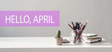 Hello April - inscription on notepad on laptop keyboardの写真素材