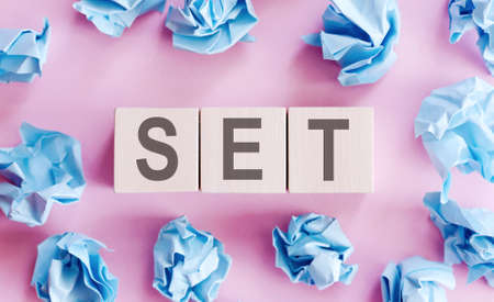 Set word in white cubes on pink backgroundの写真素材