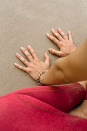 Sexy attractive blonde lady posing on the beach, sunbathing. vertical photoの写真素材