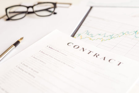 White table with business document contract form paper and empty space to sign authorized signature,...
