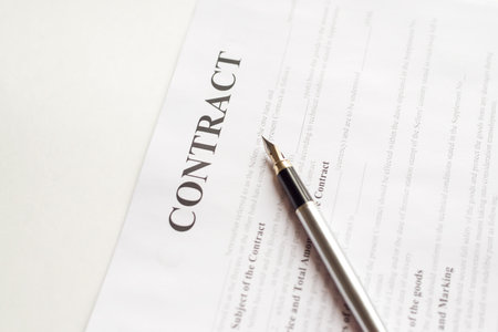 Business contract paper with fountain pen.の写真素材