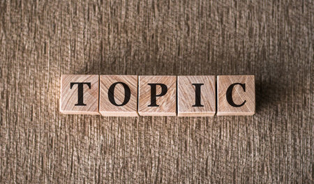 Topic - the word made from wooden blocksの写真素材