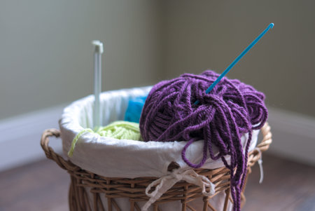 crop of a basket full of yarn and needles