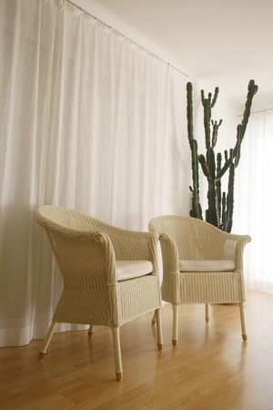 Wicker chairs indoorsの写真素材