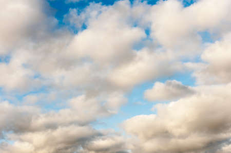 White clouds in an early morning sky backgroundの写真素材