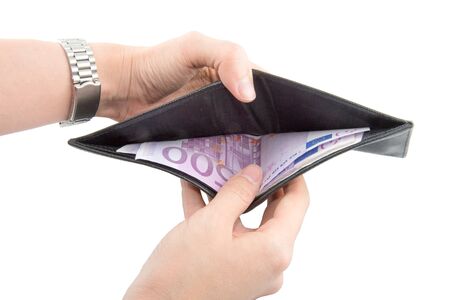 Hands opening black wallet with five hundred euro insideの写真素材