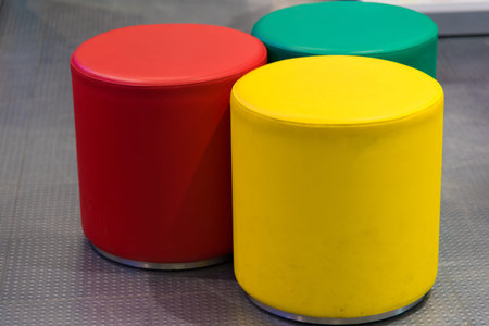 Stools in red, yellow and greenの写真素材