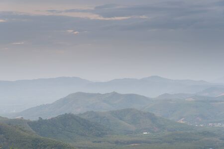 Layer of hills in Hatyai, Songkhla during sunriseの写真素材