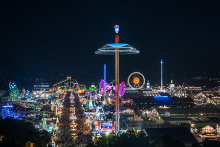 MUNICH, GERMANY - 22 SEPTEMBER 2017: Aerial view of Oktoberfest from St. Paul Cathedral at nightのeditorial素材