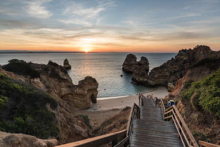 Camilo's beach (Praia do Camilo) during sunrise, Lagos, Algarve, Portugalの写真素材