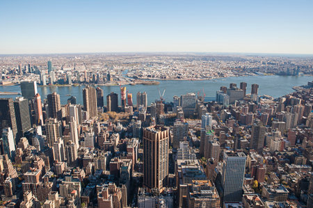 Elevated view from Empire State Building towards Manhattan, the East River side, with the iconic skyscrapers and urban dense development, in New York City, USAのeditorial素材