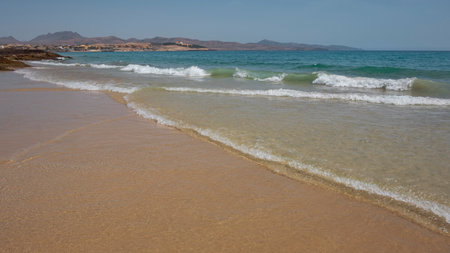 Costa Calma, a shallow-water pristine beach in the south-eastern part of the island, delighting tourists with great swimming and water sports opportunities, in Fuerteventuraの写真素材