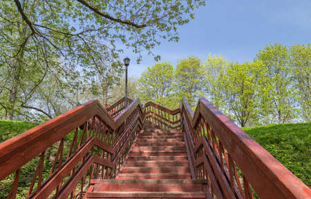 Outdoor wooden stairway in a Moscow city park.の写真素材
