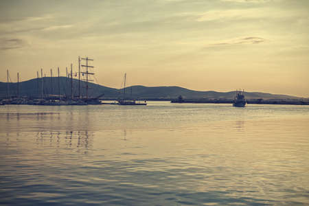 Vintage toned picture of the sea sunset.の写真素材