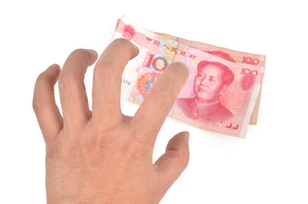 Chinese currency and handの写真素材