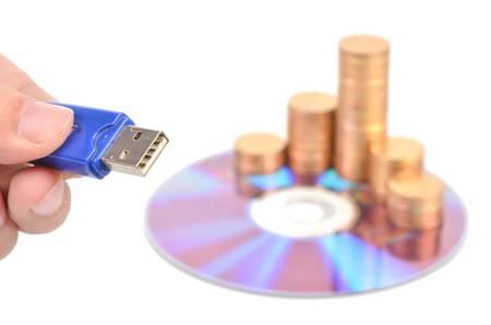 DVD and USB disk with coinsの写真素材