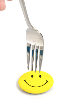 Smile face and fork