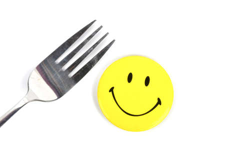 Smile face and forkの写真素材
