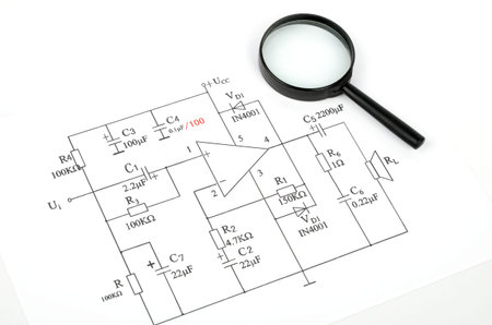 Circuit diagram and magnifierの写真素材