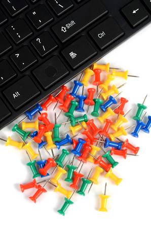 Computer keyboard and push pinの写真素材