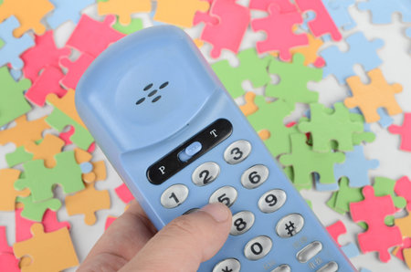 Telephone and puzzle