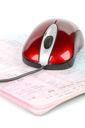 Computer mouse and account passbookの写真素材