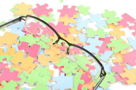 Eye glasses and puzzleの写真素材