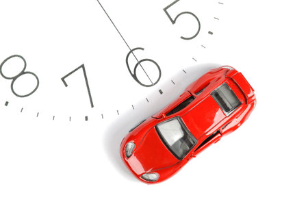 Toy car and clockface