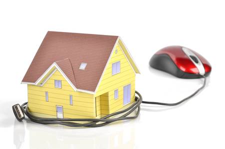 Model house and computer mouseの写真素材