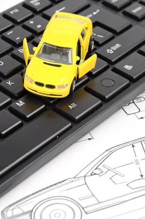Computer keyboard and car blueprintの写真素材